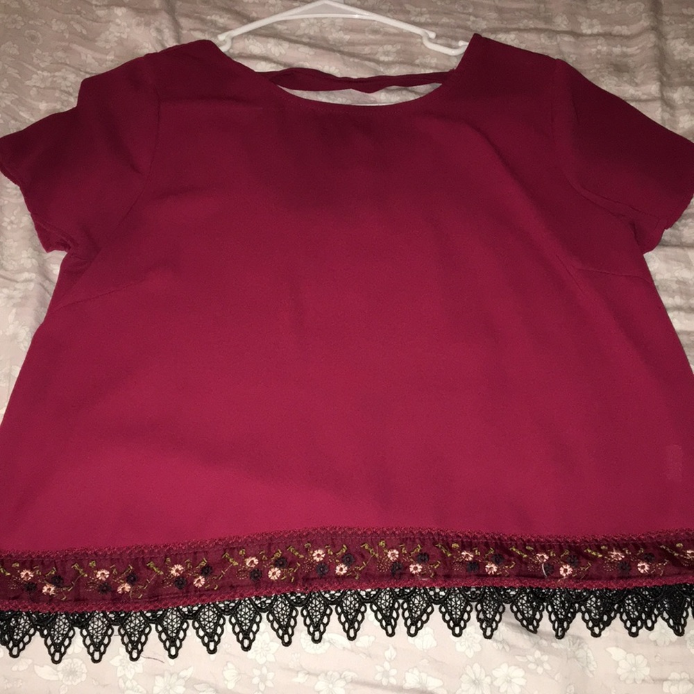 burgundy shirt with flower and lace details
